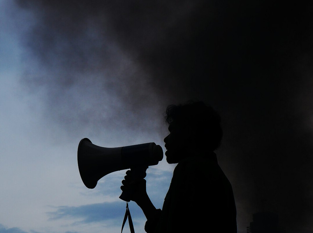 confident leader using voice on stage