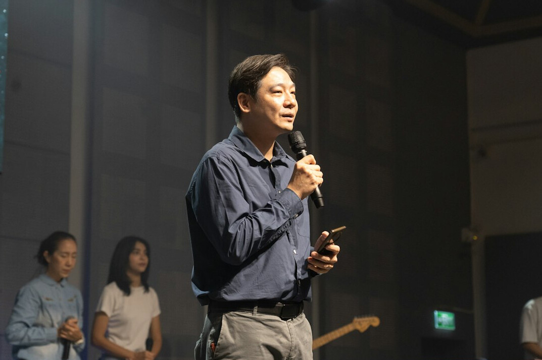 confident leader on stage