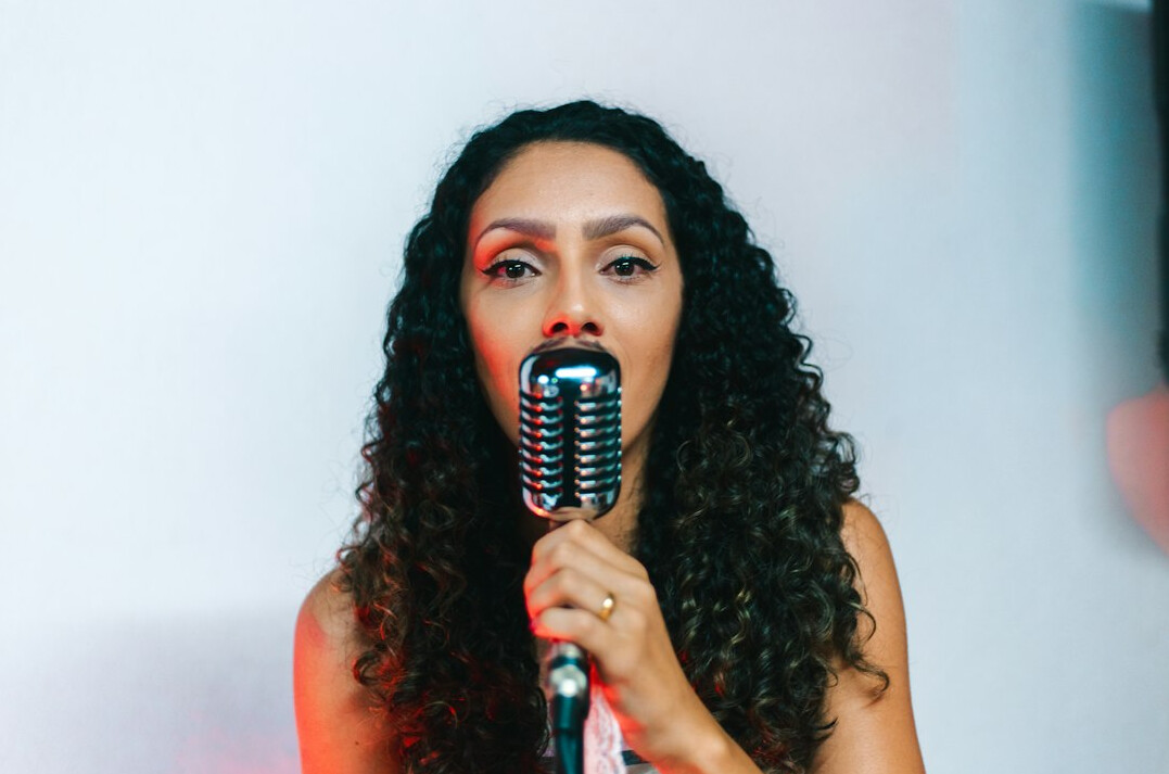 woman practicing voice exercises